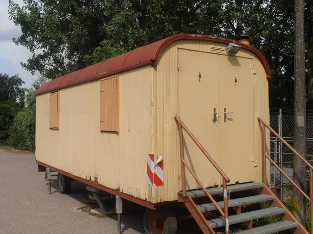 Portable toilet in OEM during a summer festival. DOT Portable Restroom Transport Rules for Trailers