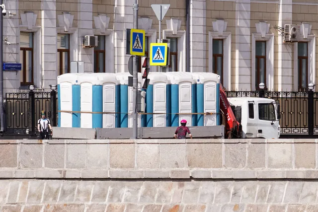 Moscow, after the spring semi-marathon, trucks haul out temporary porta-potties. Portable restroom fleet operating cost per mile: US routes