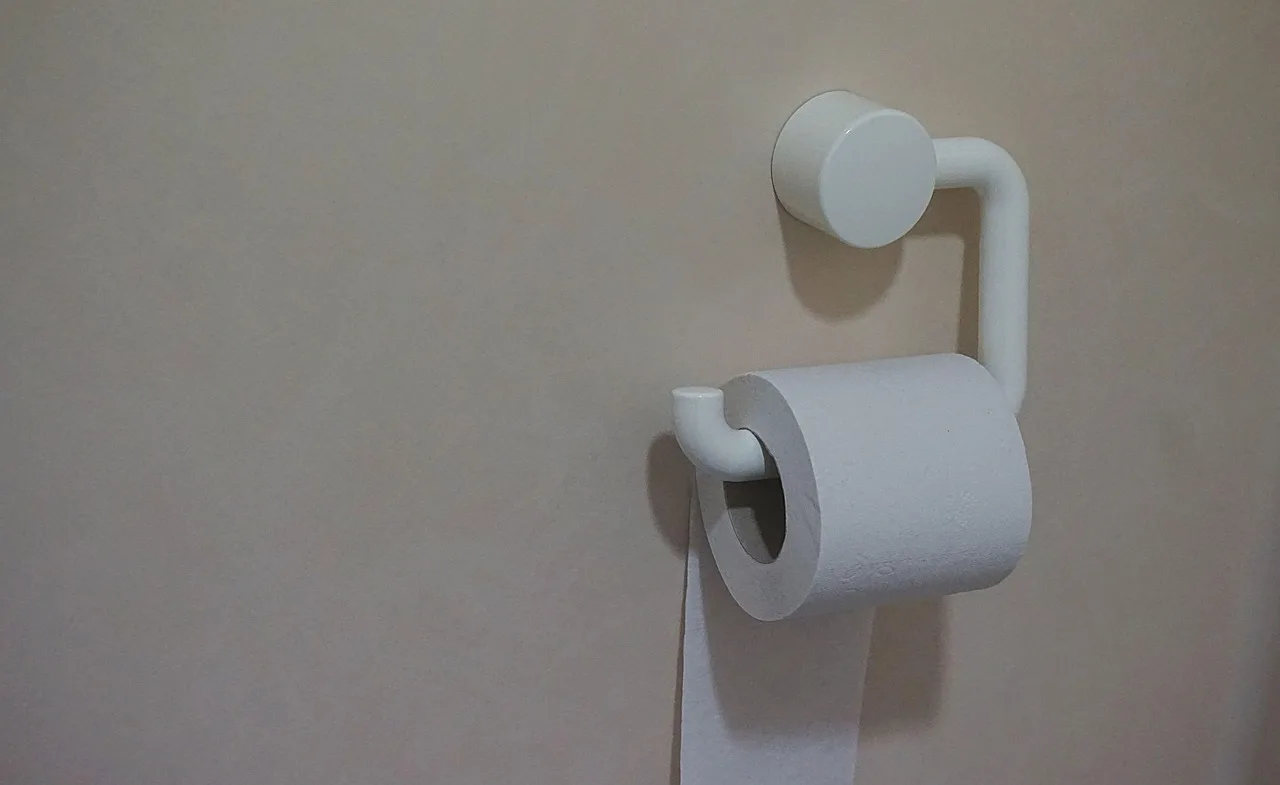 paper, tissue, roll, tissue holder, toilet, wall, gray paper, gray wall, gray toilet, toilet, toilet, toilet, toilet, toilet. Portable Restroom Pumping Frequency: Weekly vs Event-Based Routes