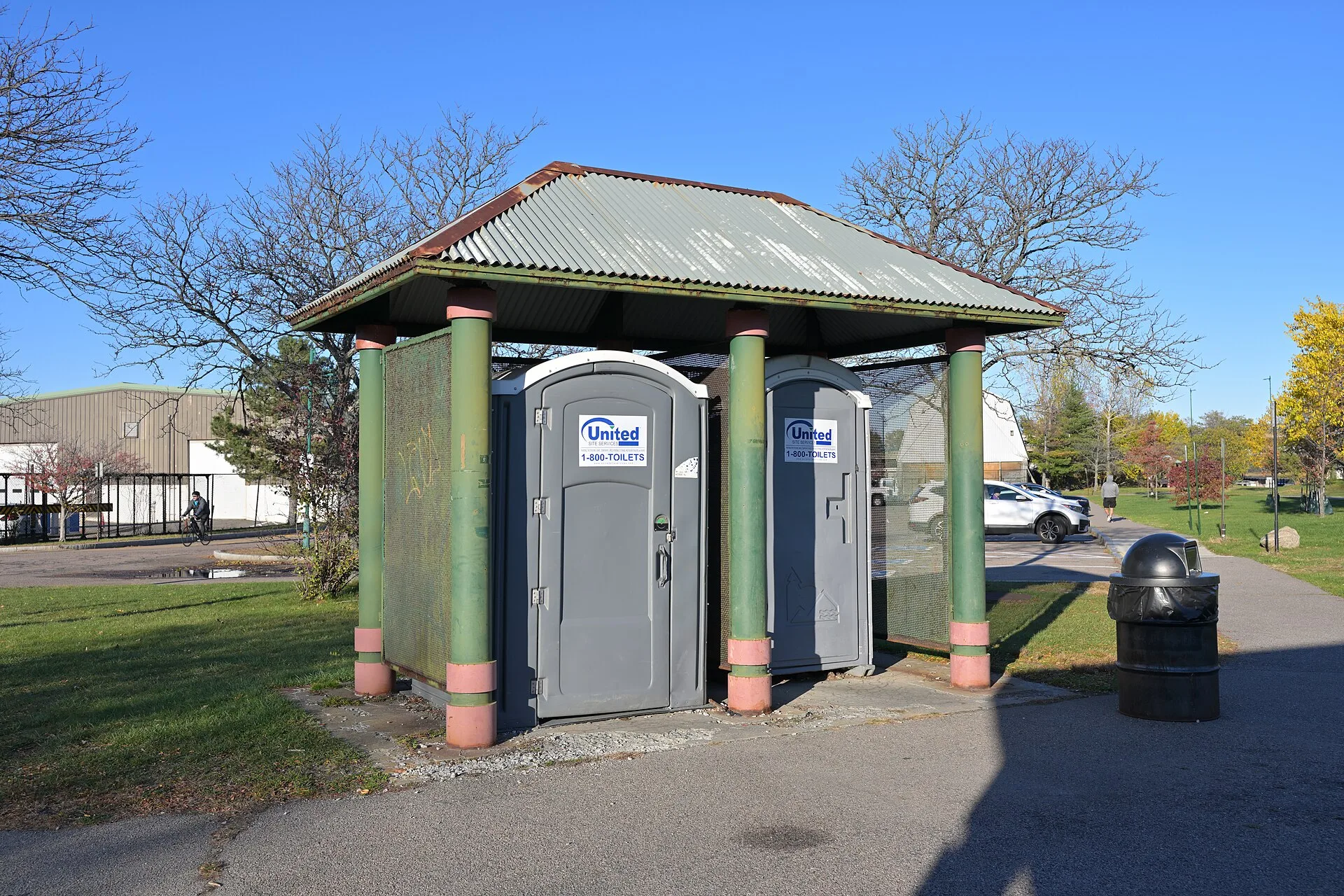 Enclosed portable toilets at Pope John Paul II park. Portable restroom rental quote template structure